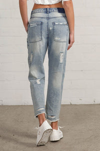 RAW HEM PATCHED JEANS